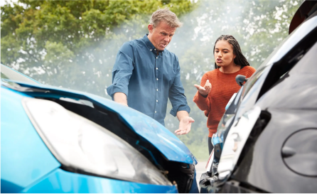 People examine car after a wreck 2