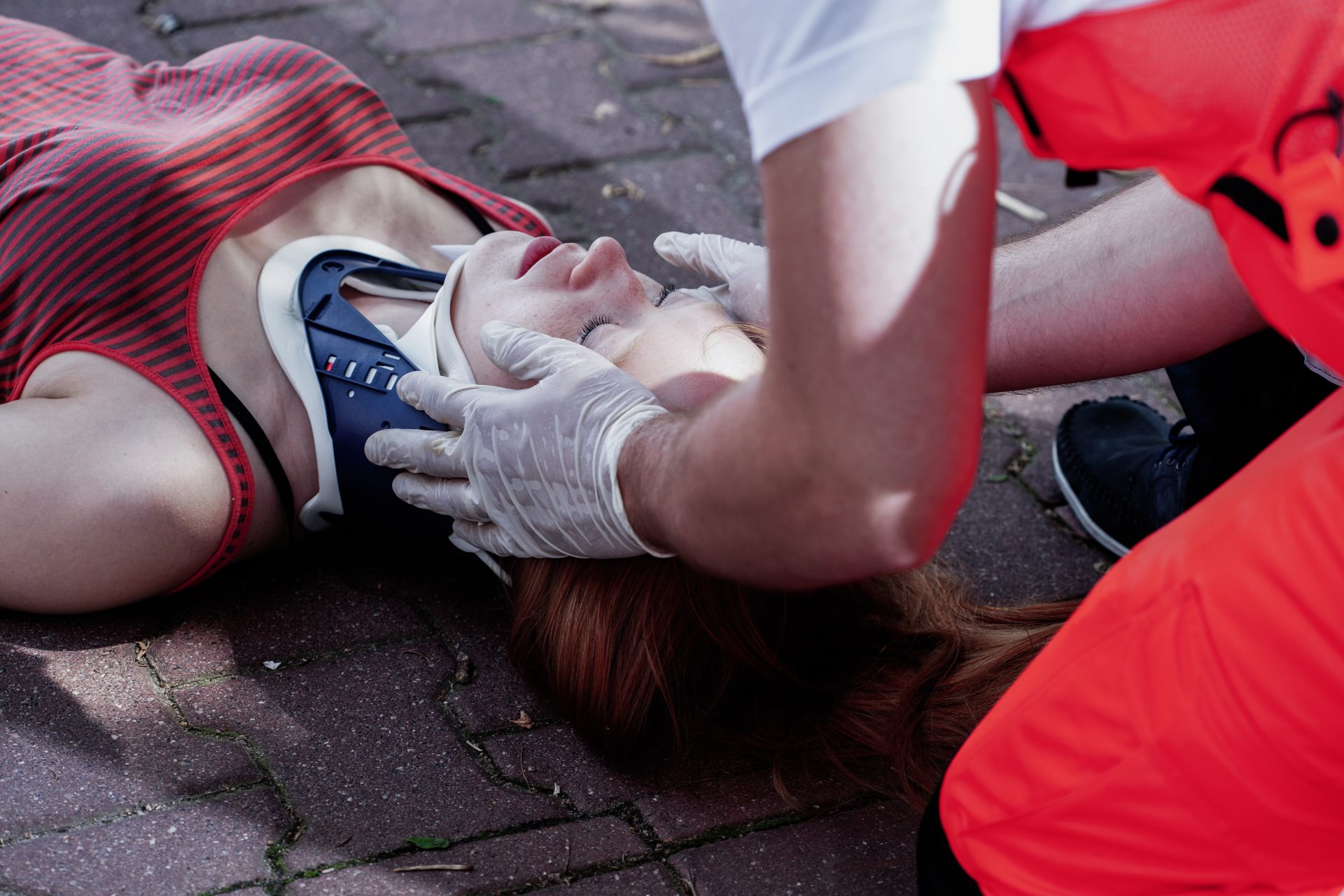 close-up-of-a-paramedic-helping-a-car-accident-vic-2021-08-28-20-05-33-utc